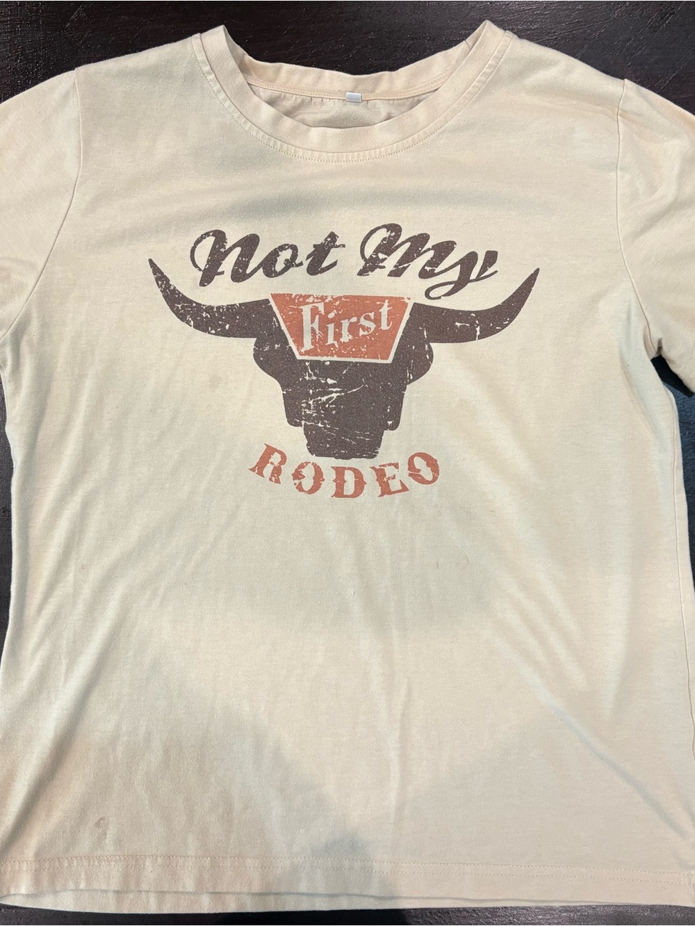 Graphic Tee "Not My First Rodeo" - Cream with Brown & Rust Print